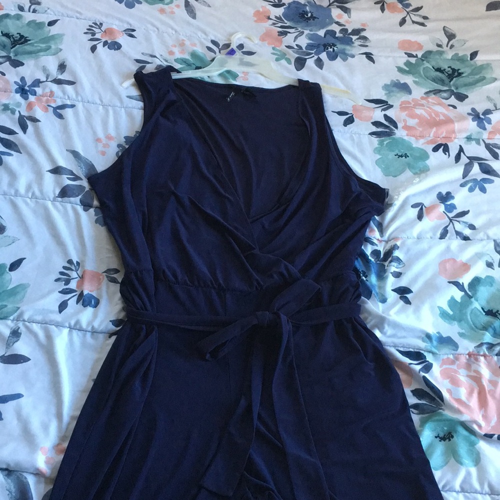 Dark navy blue romper with long pants.